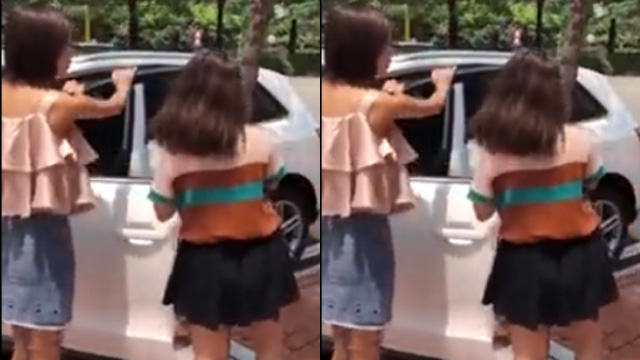 2 em gái vật vã tìm cách đóng cửa ôtô khiến người đi đường phì cười